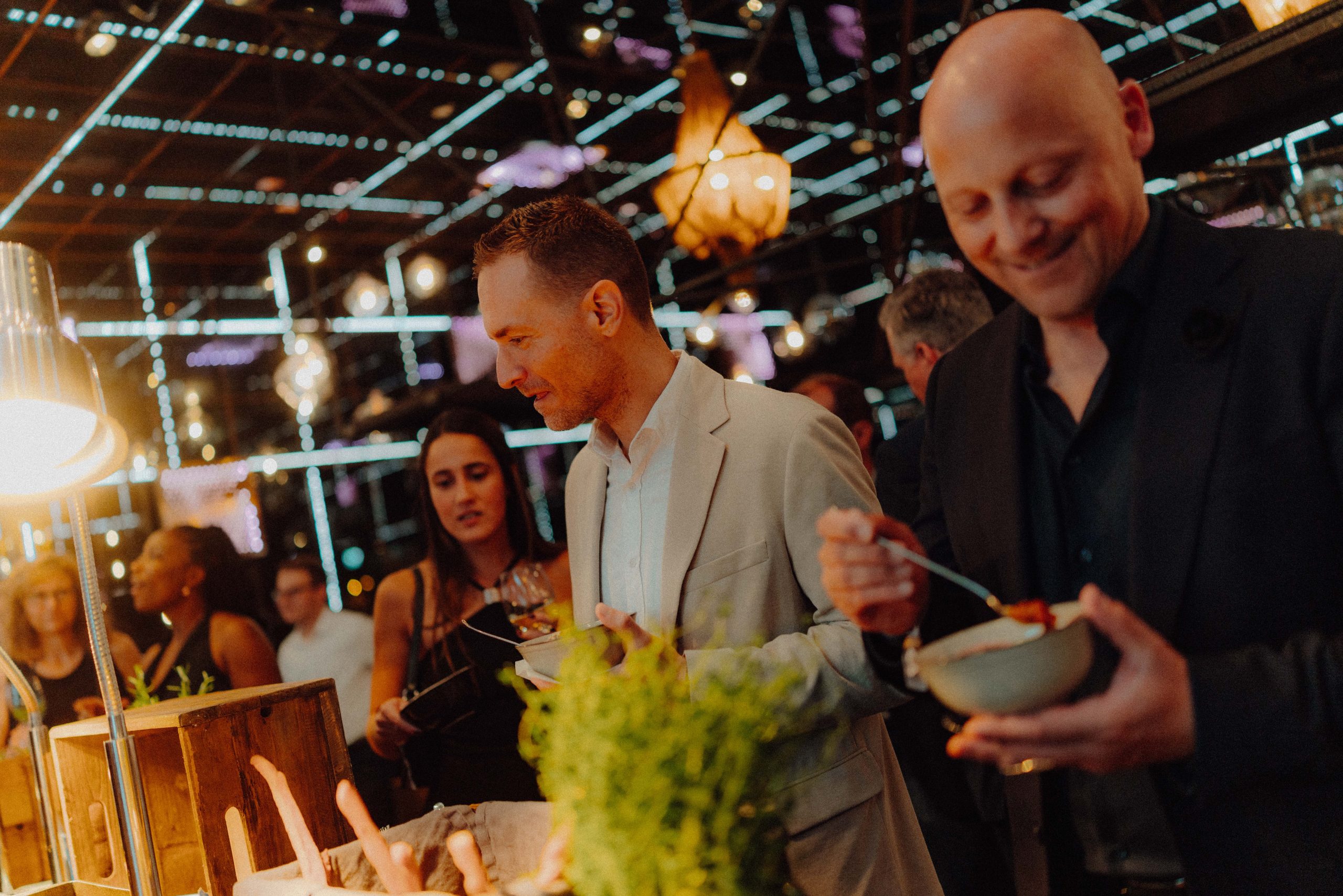 Guests enjoying the dinner at the live cocking stations.